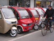 China's seniors dodge police, beat traffic, in electric minicars